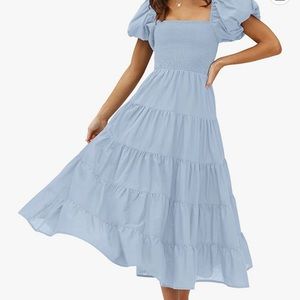 Zesica blue dress with puff sleeves and ruffle skirt